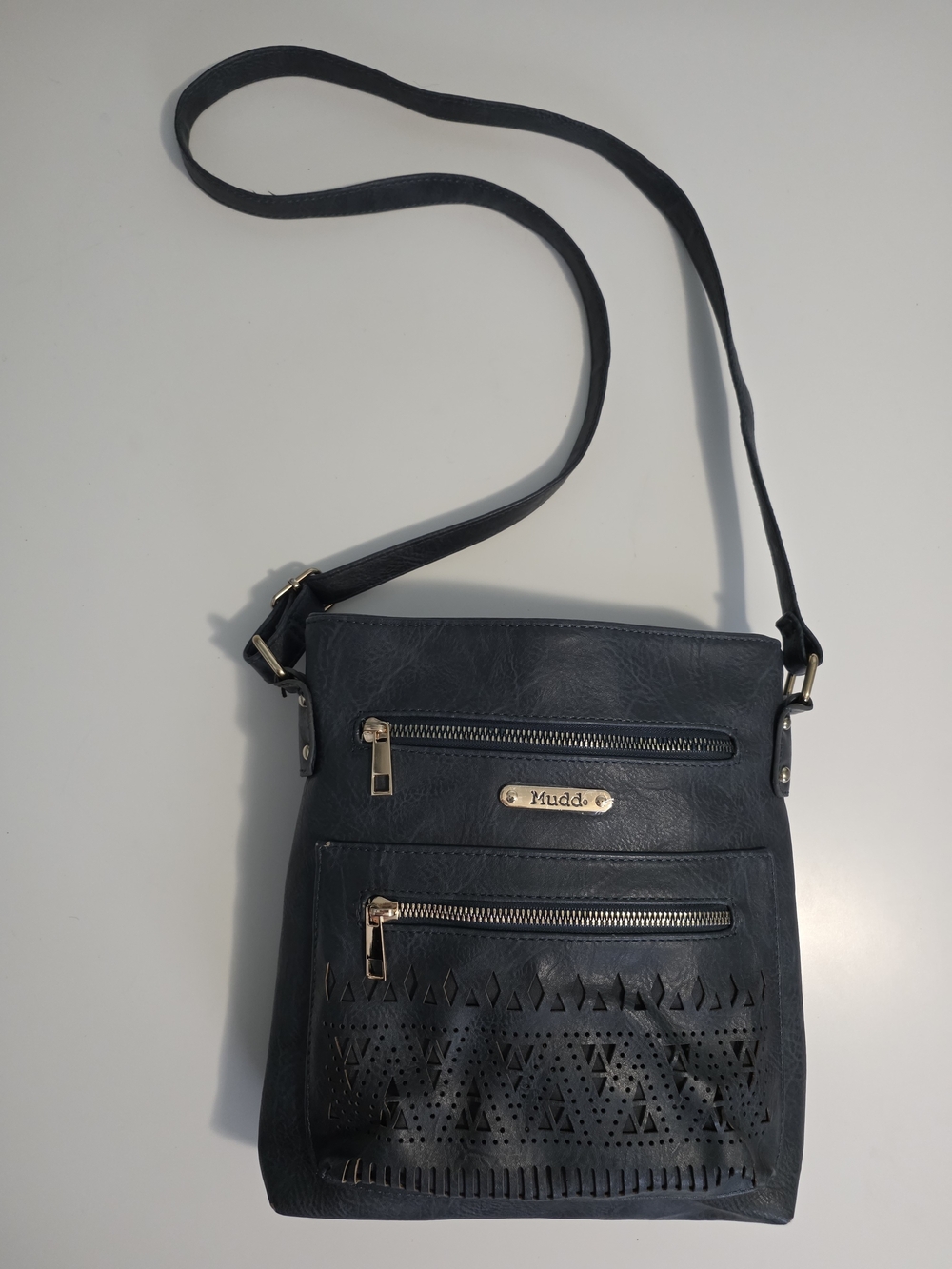 Mudd Navy Crossbody with Laser-Cut Front and Gold Hardware